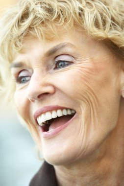 Portrait Of Senior Woman Laughing clipart