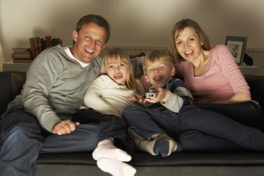 Family Watching Television Together clipart