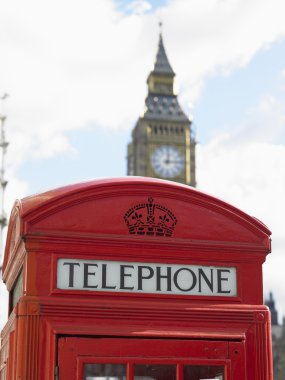 Telephone Booth In Front Of Big Ben Clock Tower, London, England clipart