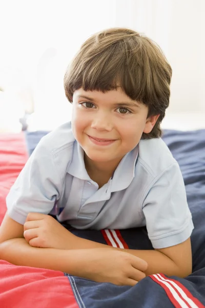 Young Boy Lying Down On His Bed — Stock Photo, Image