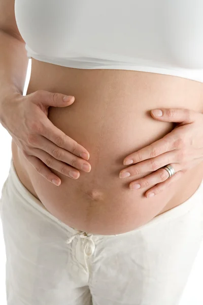 Pregnant Woman Holding Exposed Belly — Stock Photo, Image