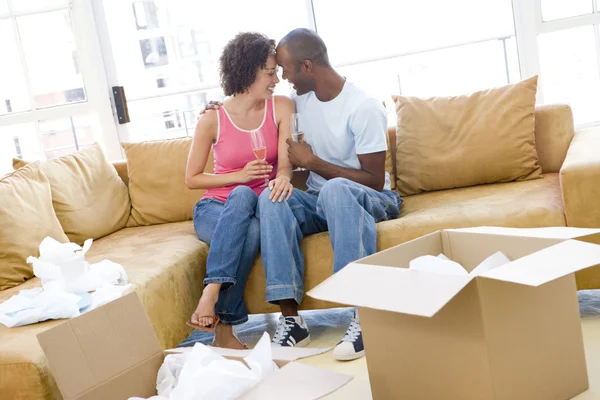 Couple Relaxing Champagne Boxes New Home Smiling — Stock Photo, Image