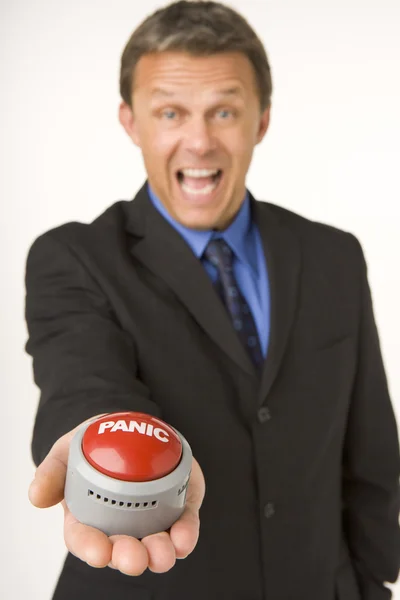Businessman Holding A Panic Button — Stock Photo, Image