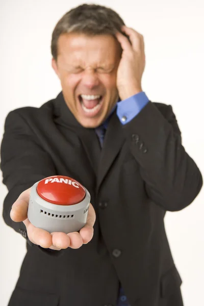 Businessman Holding Panic Button — Stock Photo, Image