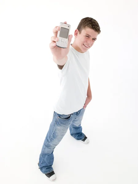 Adolescente Niño Sosteniendo Teléfono Celular Sonriendo —  Fotos de Stock