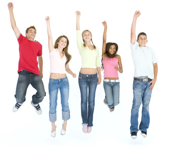 Five friends jumping and — Stock Photo, Image