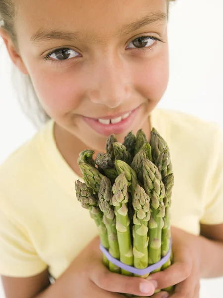 Young Girl Holding Bunch Asparagus Smiling — Stock Photo, Image