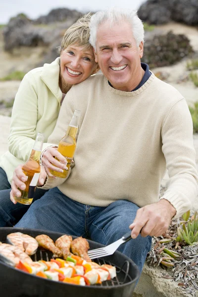 Couple Cooking On A Barbeque — Stock Photo, Image