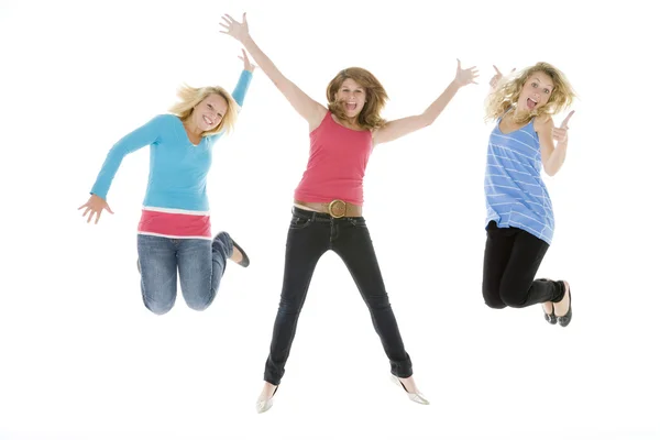 Happy excited family jumping — Stock Photo © AndreyPopov #12794561