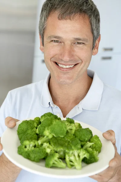 Homem Meia Idade Segurando Uma Placa Brócolis — Fotografia de Stock