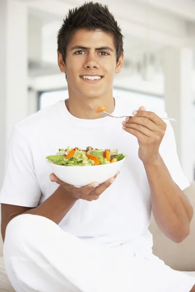 Young Man Eating Salad — Stock Photo, Image