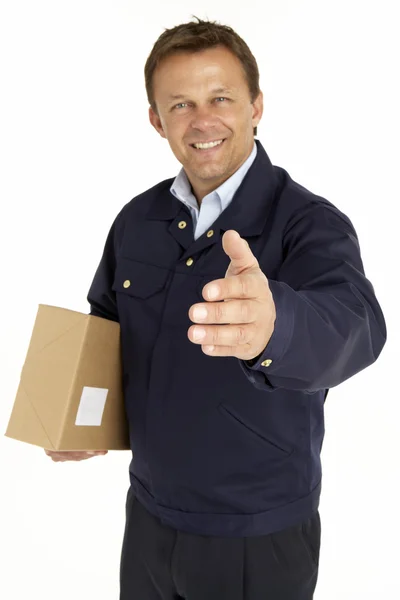 Courier Extending His Hand Handshake Holding Parcel — Stock Photo, Image