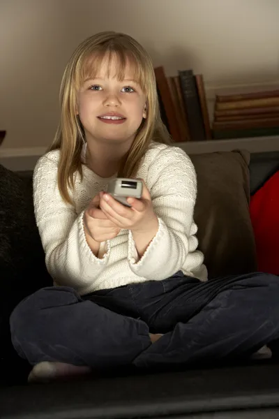 Young Girl Using Remote Control — Stock Photo, Image