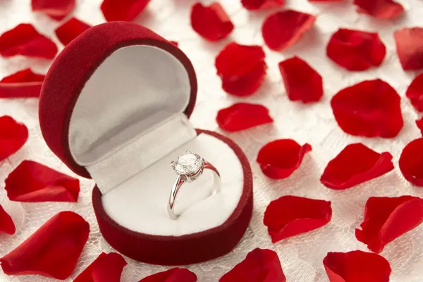Diamond Ring Heart Shaped Box Surrounded Rose Petals — стоковое фото