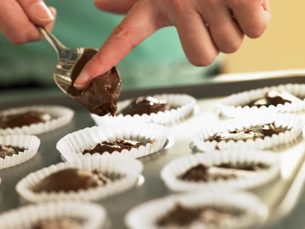 Putting Chocolate Cupcake Mix Baking Tin — Stock Photo, Image