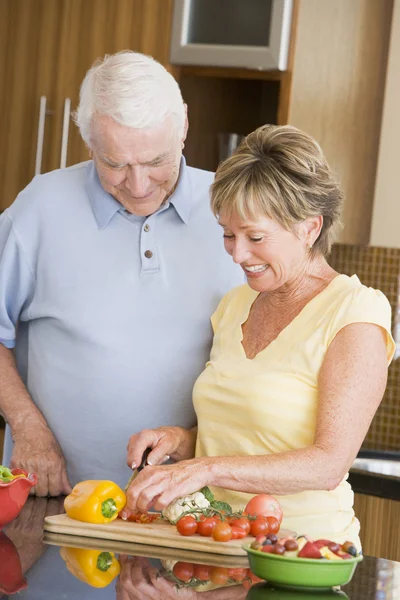 Husband And Wife Preparing Vegetables Royalty Free Stock Photos