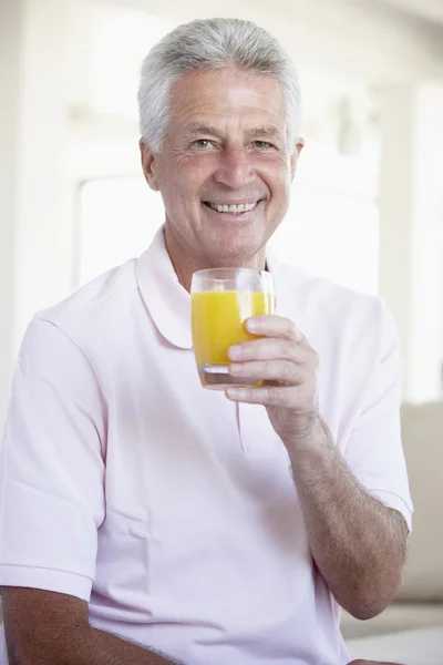 Middle Aged Man Drinking Orange Juice — Stock Photo, Image