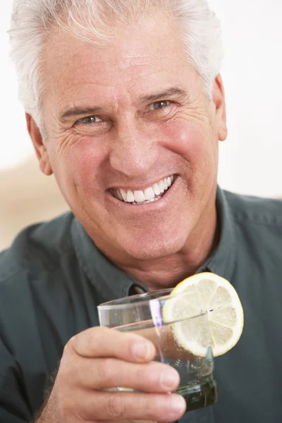 Man Having A Drink At Home — Stock Photo, Image