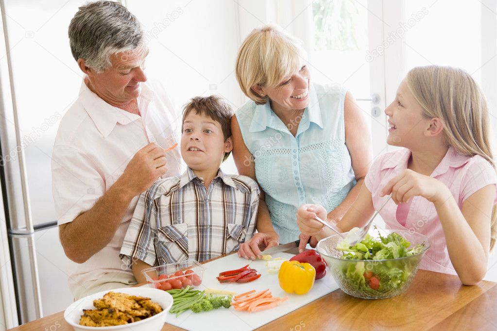 Grandparents And Grandchildren Prepare A meal,mealtime Together — Stock ...