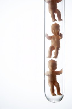 Baby Figurines In Test Tubes clipart