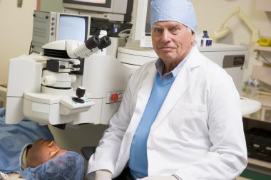 Doctor And Patient About To Undergo Eye Exam clipart