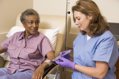 Nurse Giving Patient Injection clipart