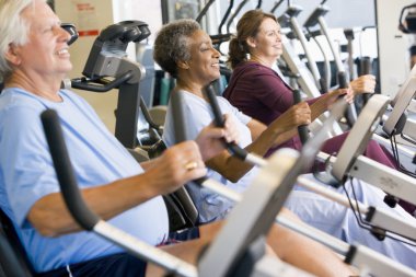 Patients Working Out In Gym clipart