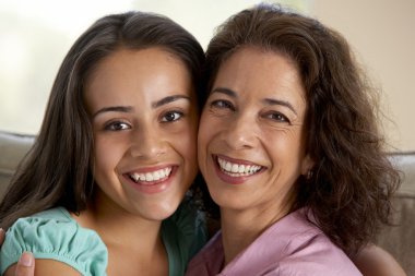 Mother And Daughter Together At Home clipart