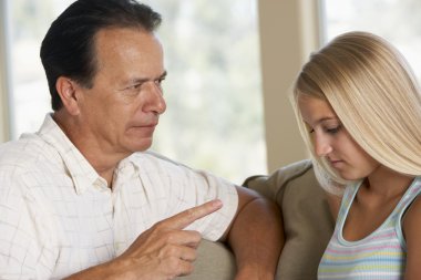 Man Having A Serious Talk With His Daughter clipart