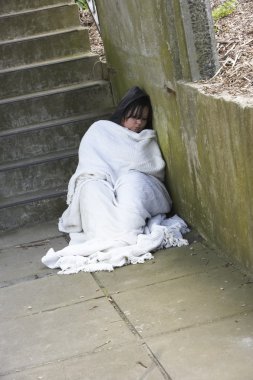 Homeless Girl Sleeping Rough clipart