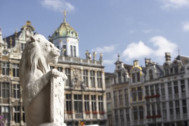 The lion sculpture and tower on Grand Place or Grote Markt in Brussels. Belgium clipart