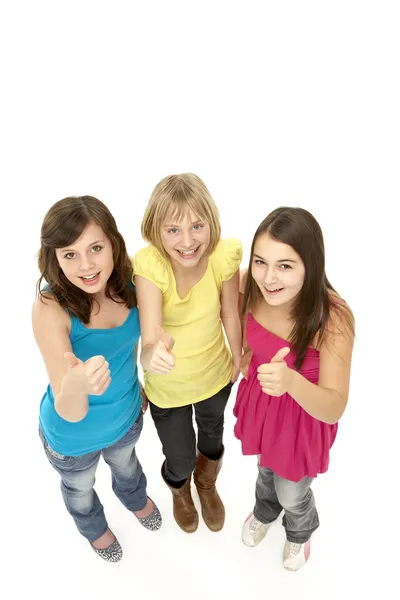 Grupa trzech młodych dziewcząt w studio — Zdjęcie stockowe