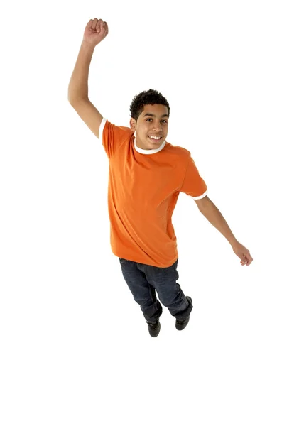 Młody chłopak skacząc w studio — Zdjęcie stockowe