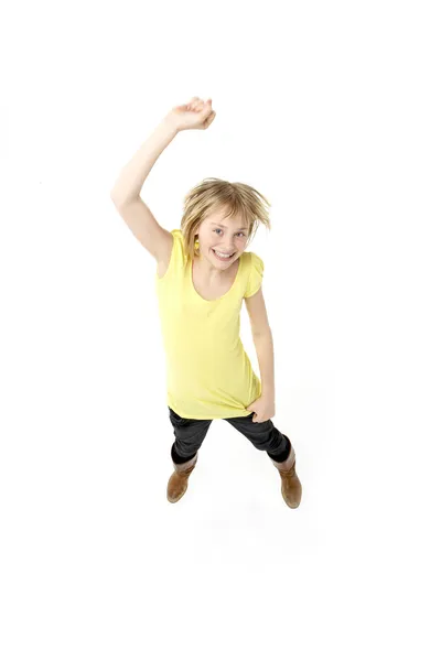 Jovem menina pulando no estúdio — Fotografia de Stock
