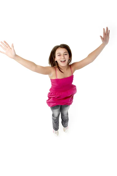 Mladá dívka skáče ve studiu — Stock fotografie