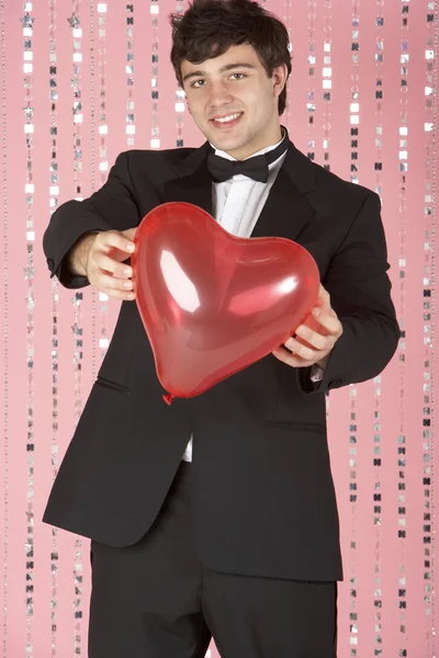 Young Man Dressed In Suit Holding Heart — Stock Photo, Image
