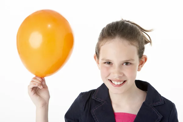 Ung flicka innehav part ballong — Stockfoto