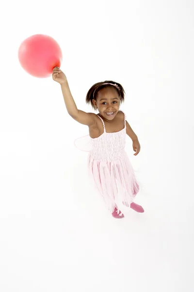 Ung flicka innehav part ballong — Stockfoto