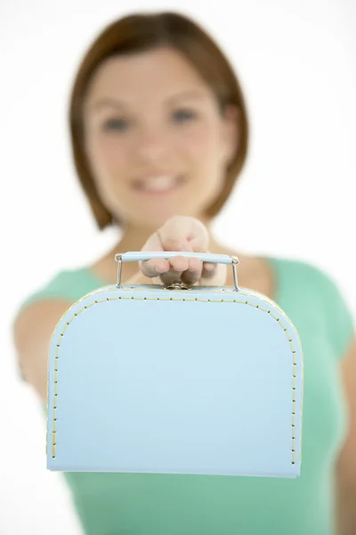 Kvinna anläggning resväska — Stockfoto