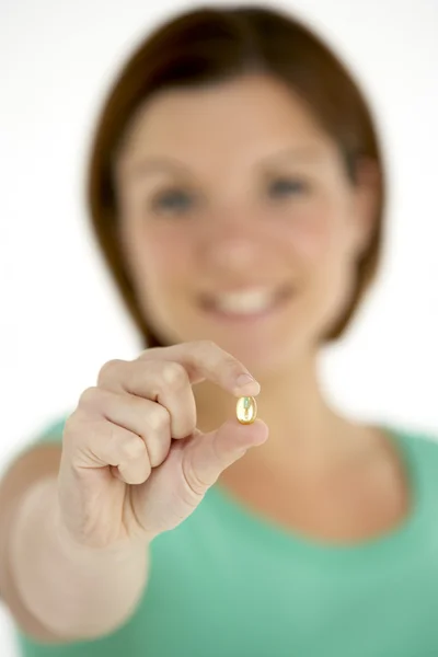 Woman Holding Vitamin Capsule — Stock Photo, Image
