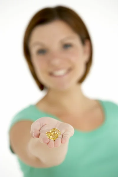 Woman Holding Vitamin Capsules — Stock Photo, Image