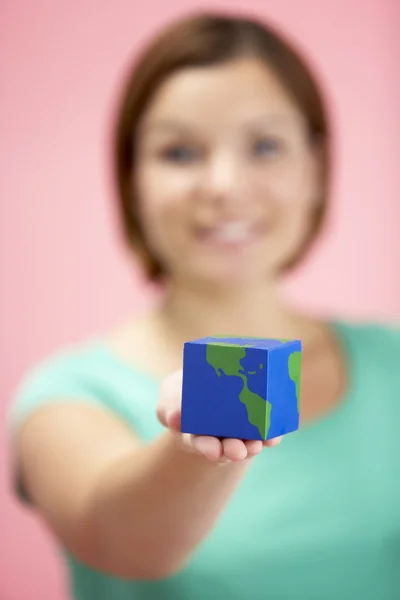 Woman Holding Cube Shaped Globe — Stock Photo, Image