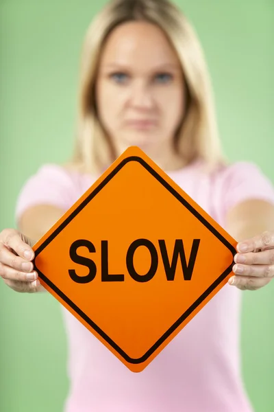 Woman Holding Road Traffic Sign — Stock Photo, Image