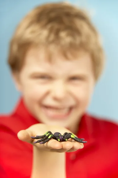 Young Boy Holding Plastic Spider — Stock Photo, Image