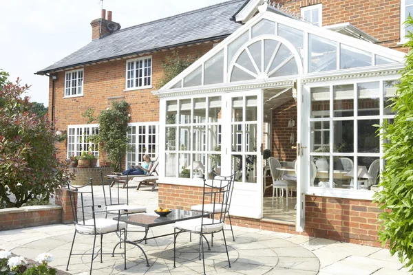 Exterior Of House With Conservatory And Patio — Stock Photo, Image