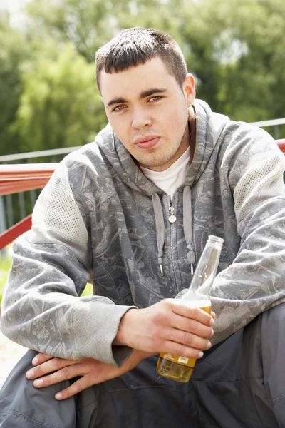 Young Man Sitting Playground Drinking Beer — Stock Photo, Image