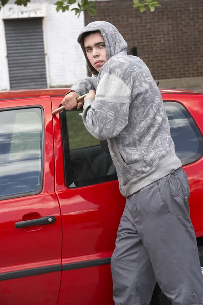 Young Man Breaking Car — Stock Photo, Image