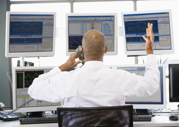 Stock Trader Talking Animatedly Phone — Stock Photo, Image
