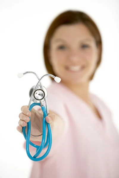 Kvinnliga Läkare Anläggning Stethescope Royaltyfria Stockfoton