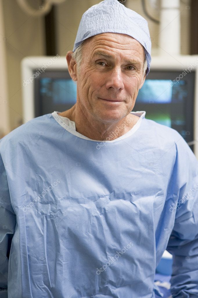 Portrait Of Surgeon In Surgical Scrubs — Stock Photo © Monkeybusiness